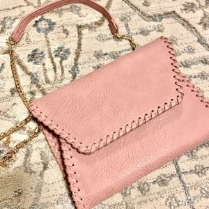 Lavender faux leather clutch with detachable chain strap. Via Stitch Fix.